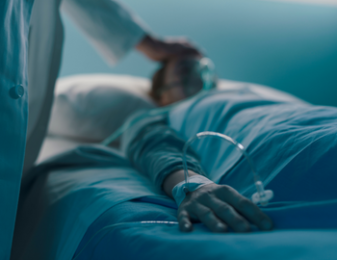 Patient sleeping in hospital bed