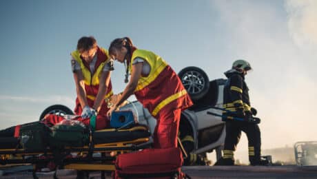 emts providing cpr to an individual who suffered a serious car accident injury